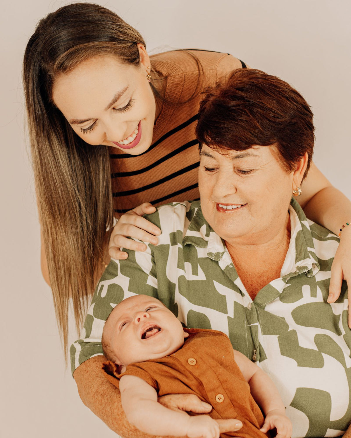Grandmother, mother and newborn together